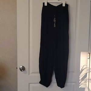 Black pants, patterned beaded ties